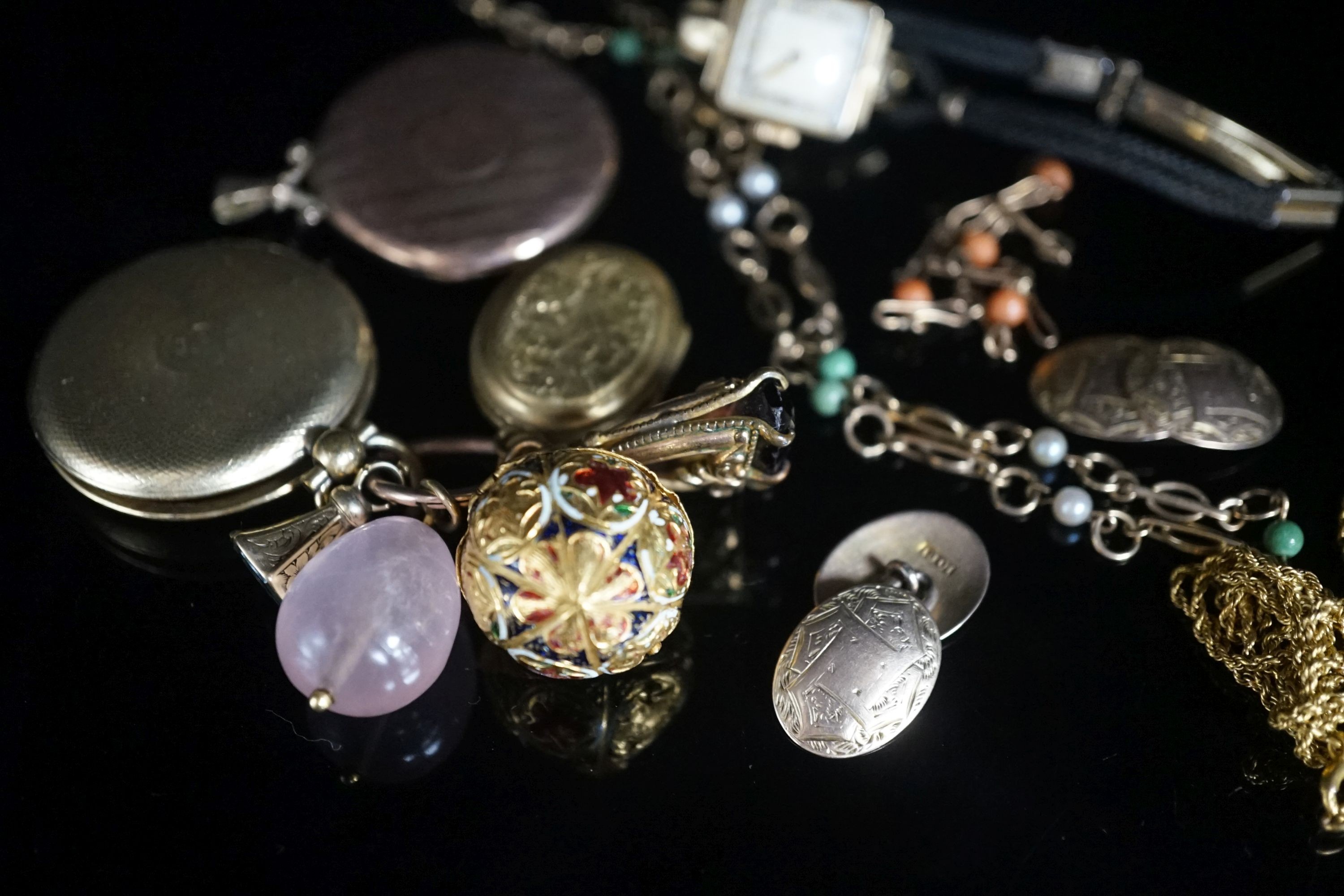 A group of mixed jewellery a pair of 10ct cufflinks, assorted fobs, a 9ct ropetwist chain(a.f.), a 9ct necklace, a 9ct gold small bracelet, wrist watch, locket etc.